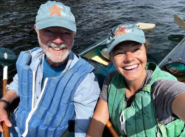 Picture of Eloise Mumford with her father Tom Mumford in a boat.